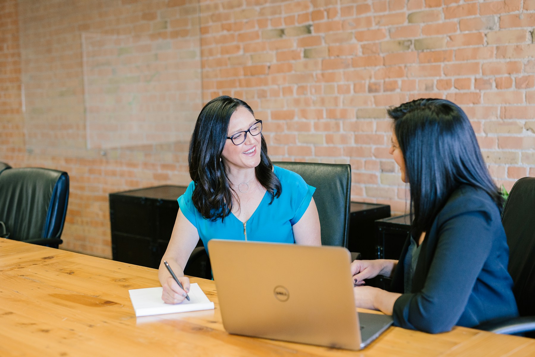 Professionals discussing details in an office